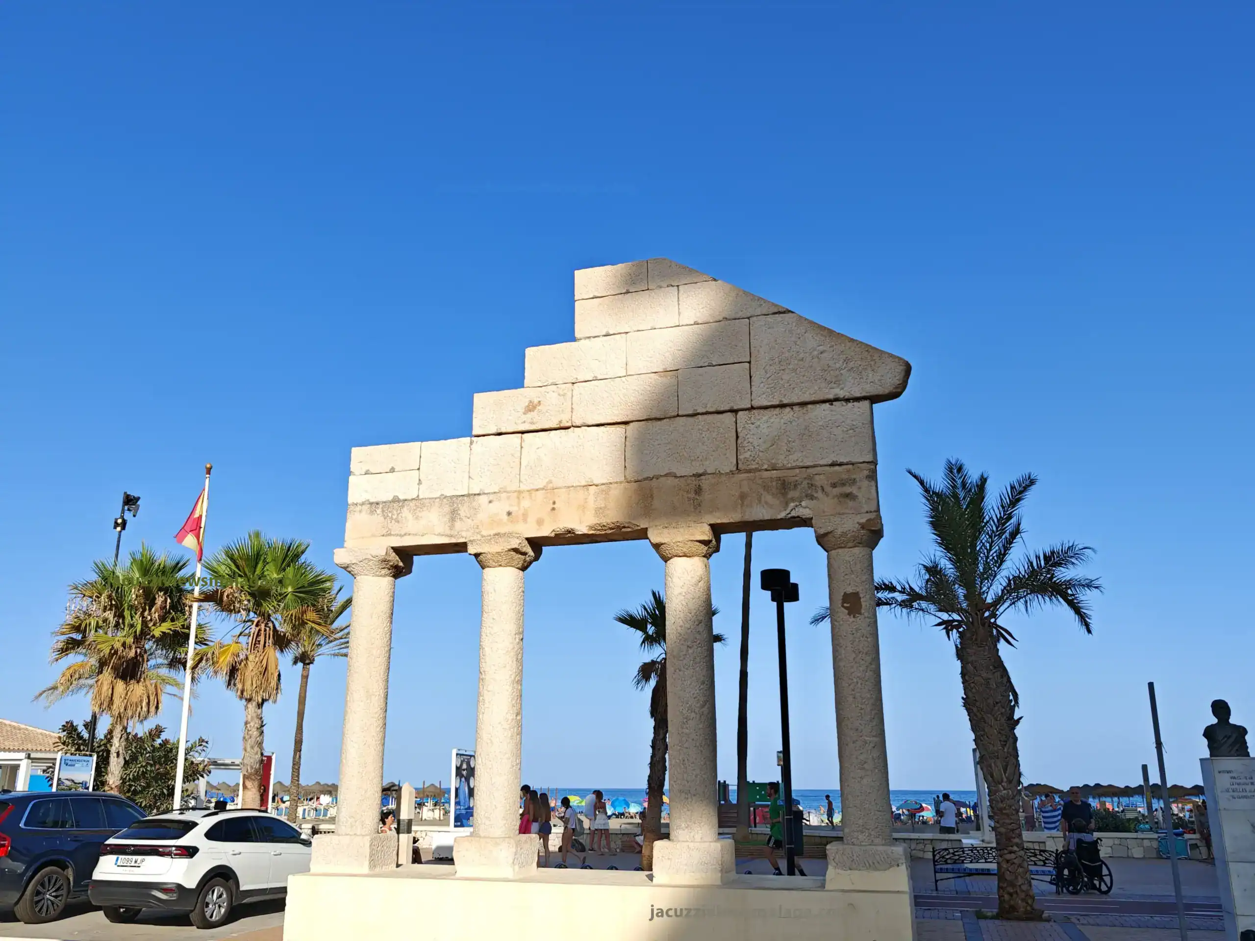 Roman Temple Portico on Los Boliches promenade in Fuengirola – historic marble columns near Malaga beaches and traditional chiringuitos on the Costa del Sol