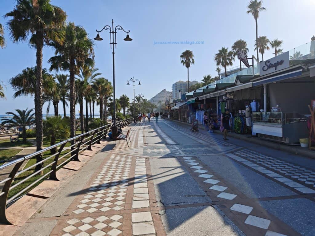 Promenade Santa Ana beach with shops