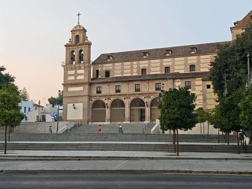 Contemporary photo of a historic Victoria church in Malaga, featuring classical architecture and a bell tower. One of the thing to do in mnalaga is visiting this church.